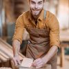 carpenter-working-with-a-wood-in-the-workshop